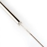 Goupillon de nettoyage inséré dans une paille en acier inoxydable