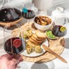 Verre identifié par un marque-verre Grappes Vacu Vin pendant un repas
