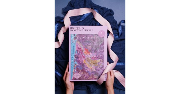 Puzzle Bordeaux Water and Wines présenté en cadeau avec un ruban