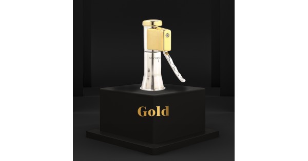 Descorjet Gold présenté sur un socle noir avec inscription Gold