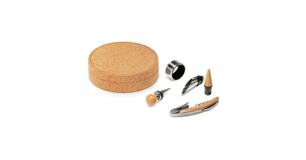 Coffret rond en liège Moreto Stricker fermé et ses quatre accessoires disposés à côté